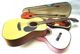 Two acoustic guitars, a violin and a ukulele.