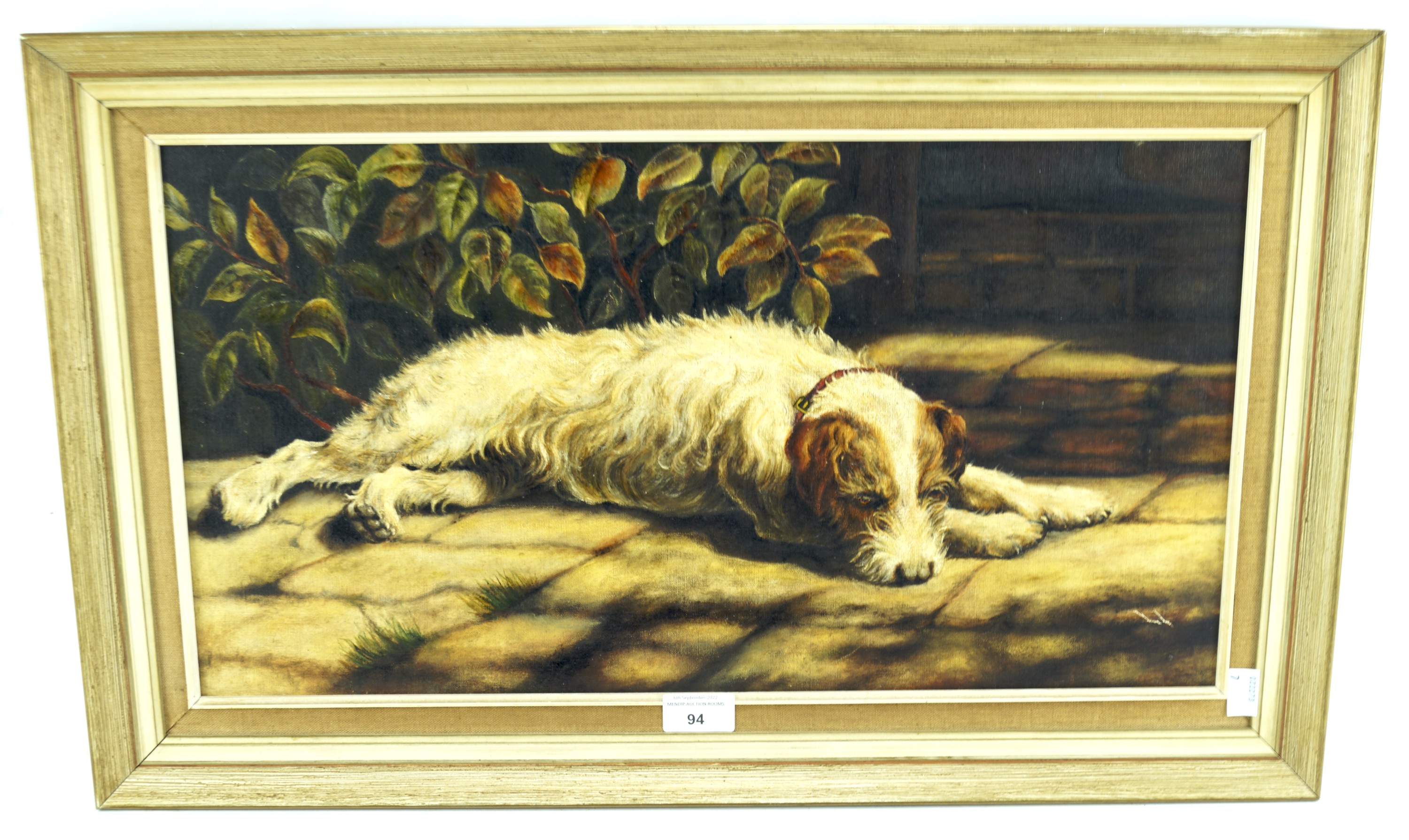 A 20th century oil on canvas. Depicting a dog lying down, unsigned,