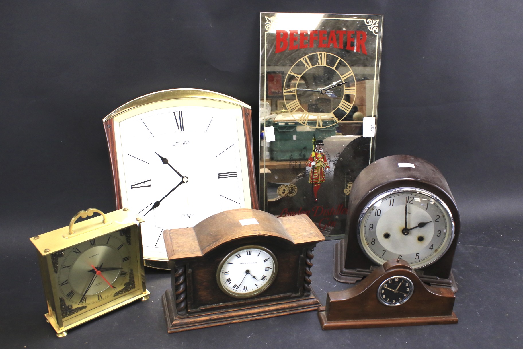 An assortment of mantel and wall clocks.