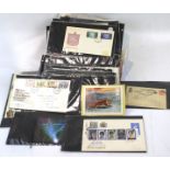 An extensive collection of stamp presentation packs and first day covers.