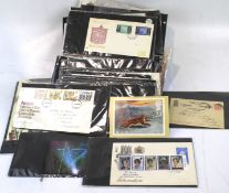 An extensive collection of stamp presentation packs and first day covers.
