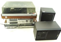 A Technics Stereo with another tuner and two speakers.