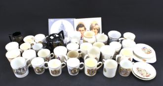 A large assortment of 19th and 20th century commemorative cups and beakers.