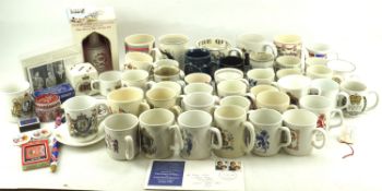 A collection of commemorative cups regarding the British Royal Family.