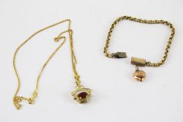 An early 20th century gold bracelet, and a modern spinning fob and chain.