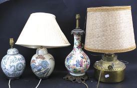 Four 20th century table lamps.