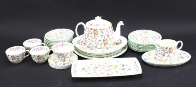 A Minton's Haddow Hall part teaset, including three teacups, eight saucers, eight tea plates,