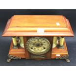 An Edwardian Seth Thomas mantel clock.