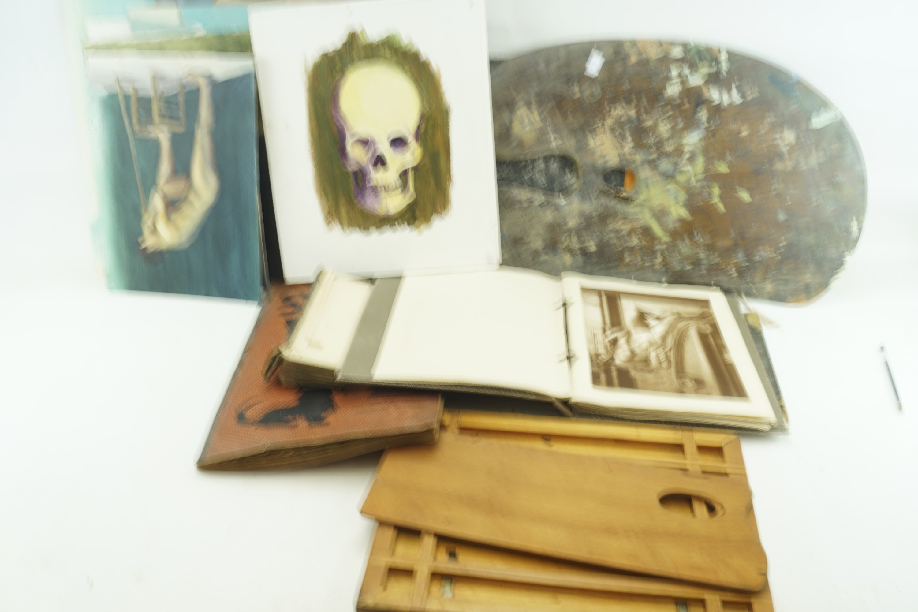 An assortment of pictures and artists pallets.