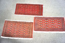 Three Eastern prayer mats.