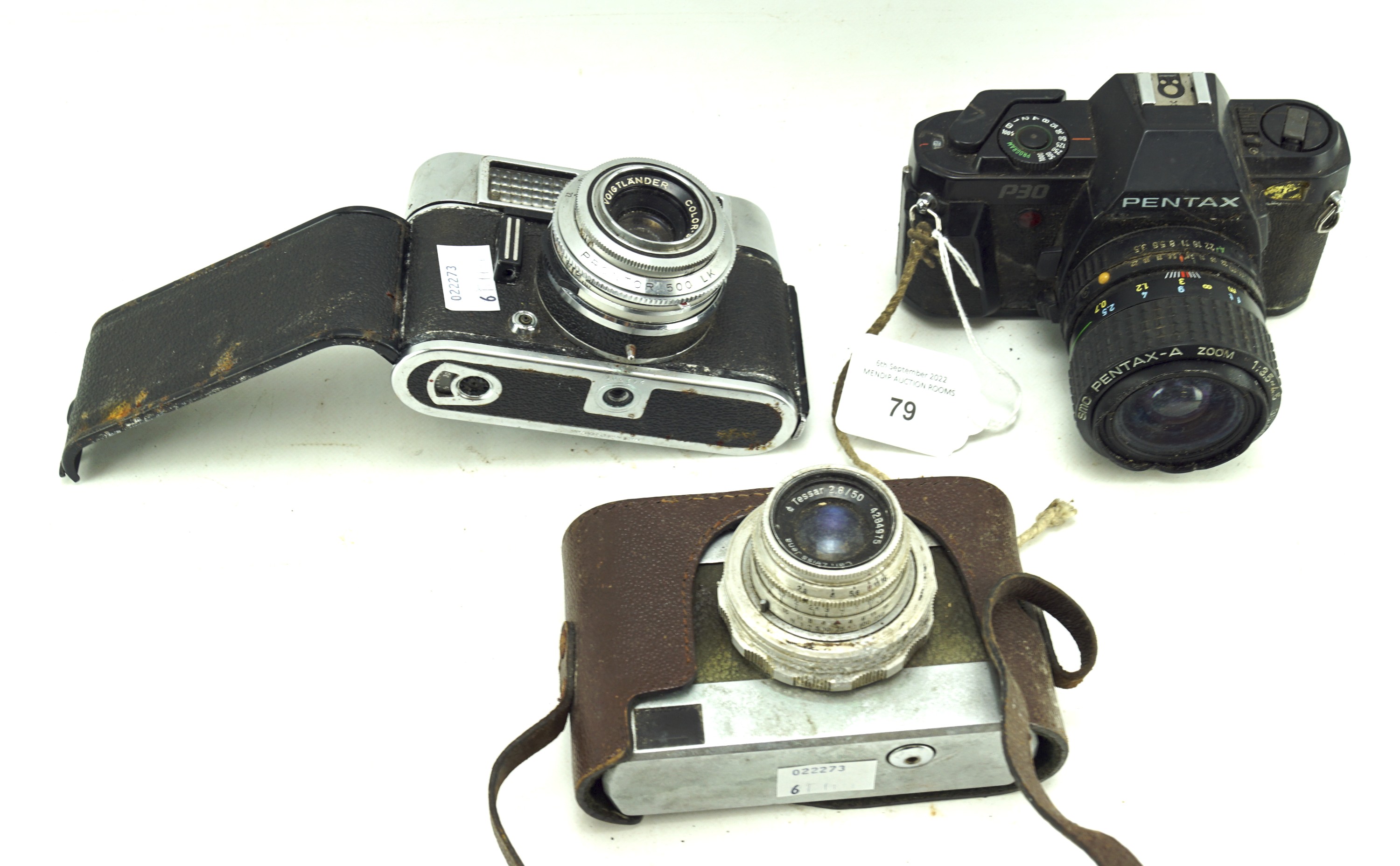 Three vintage cameras. Comprising a Pentax P30, Voigtlander no.A.P.