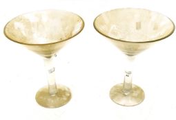 Two novelty oversized large Martini glasses.