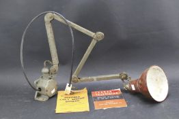 A vintage workbench anglepoise lamp with brown shade.