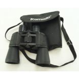 A cased pair of Komodo binoculars.