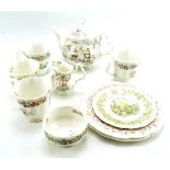 A Royal Doulton part tea set from the Brambly Hedge collection, including four mugs, teapot,