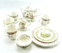 A Royal Doulton part tea set from the Brambly Hedge collection, including four mugs, teapot,