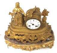 A gilt French style mantle clock.