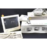 Acorn A3010 computer with keyboard, screen, games manuals,