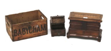 Three wooden storage and jewellery boxes.