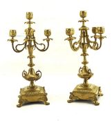 A pair of 20th century gilt metal candelabra.