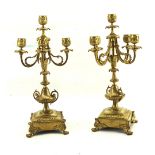 A pair of 20th century gilt metal candelabra.