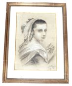 An Edwardian charcoal portrait. Depicting a young woman, signed and dated