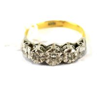 An 18ct gold ring diamond set lady's ring.