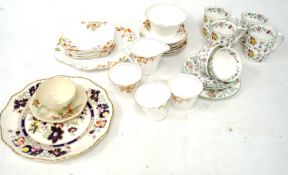 A Mintons Haddon Hall set of mugs and teaware.