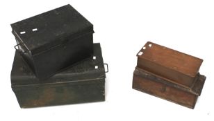 Two metal storage boxes and two wooden boxes.