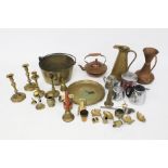 An assortment of brassware and other metalware.