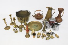 An assortment of brassware and other metalware.