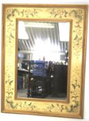 A large contemporary mirror.