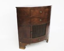 An 19th century mahogany veneer corner unit.