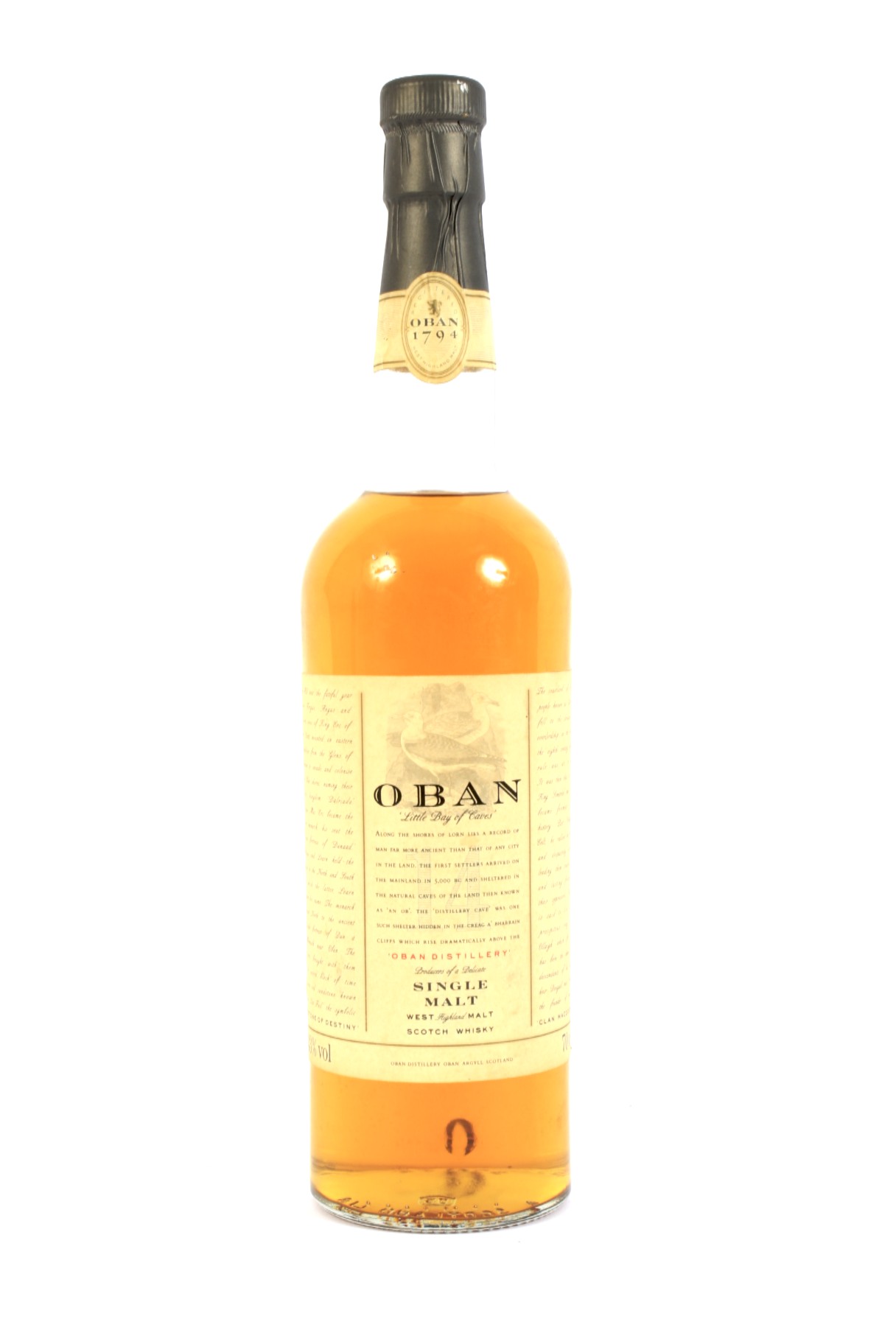 A bottle of Oban 14 year old single malt Scotch whisky.