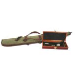 A green gun case, unmarked,