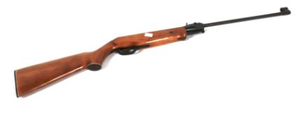 Air rifle with safety catch.