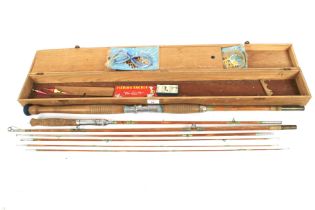 A cased E6150 split cane fishing rod