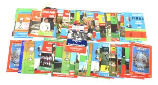 A quantity of 1960s Wembley Stadium football programmes.