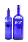 Two bottles of Sky Vodka in blue bottles, both 40% vol, 1.75L and 70cl.