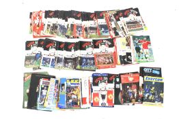 A box of football programmes.