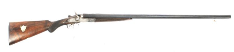 A Midland Wildfowling hammer action shotgun. 12 gauge, 32inch barrell, 3inch chamber.