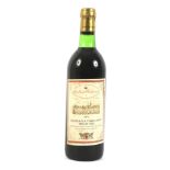 A bottle of Ets Saint Ferdinand Chateau la Tour Capet Grand Cru 1971.