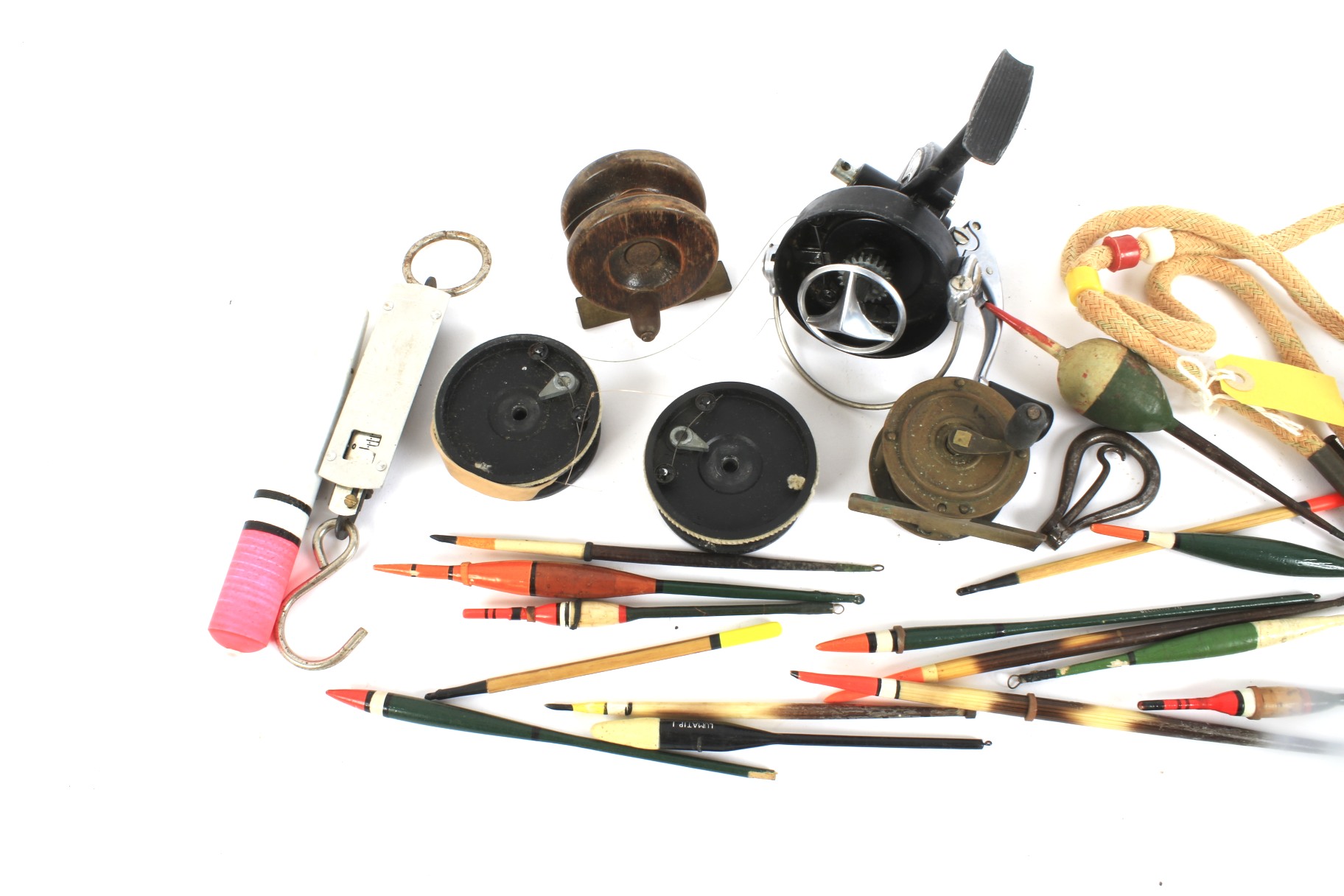 A small assortment of fishing accessories. Including reels, floats, etc. - Image 2 of 2