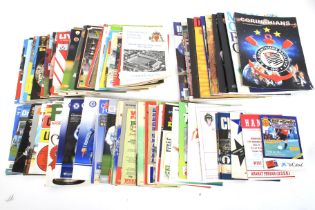 A box of approximately 100 football programmes.