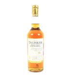 A bottle of Talisker 18 year old single malt Scotch whisky. 45.