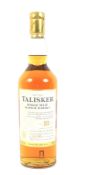 A bottle of Talisker 18 year old single malt Scotch whisky. 45.