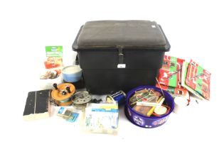 A fishing tackle box and accessories.
