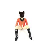 A novelty Casa Roma fox dressed in hunting garb.