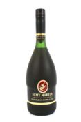 A bottle of Remy Martin Fine Champagne Cognac Napoleon Extra Old.