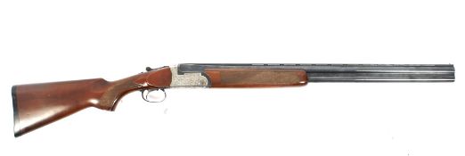 A Zoli 12 gauge over and under ejector shotgun. 271/2 inch barrels. 2 3/4 inch chambers.